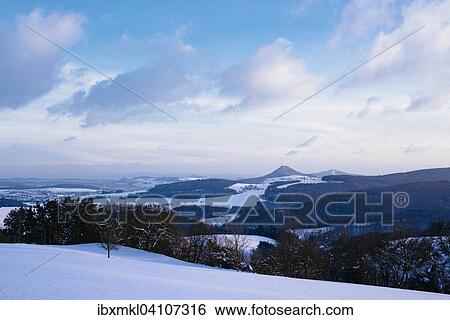 Winter landscape in Hegau, on the horizon of the Hegau volcano Hohenhewen, Konstanz, Baden-Wurttemberg, Germany, Europe View Large Photo Image Stock Photograph - Winter landscape in Hegau, on the horizon of the Hegau volcano Hohenhewen, Konstanz, Baden-Wurttemberg, Germany, Europe. Fotosearch