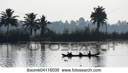 Woman taking children to school in a small boat, Backwaters canal system, Kerala, South India, India, Asia View Large Photo Image Stock Photo - Woman taking children to school in a small boat, Backwaters canal system, Kerala, South India, India, Asia. Fotosearch