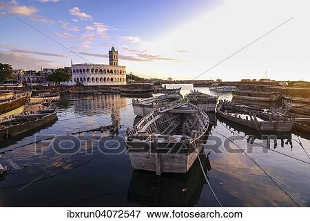 Wooden boats in the old harbour of Moroni, Grande Comore, Comoros, Africa View Large Photo Image Stock Photo - Wooden boats in the old harbour of Moroni, Grande Comore, Comoros, Africa. Fotosearch