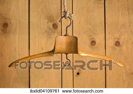 Wooden clothes hanger View Large Photo Image Stock Image - Wooden clothes hanger. Fotosearch