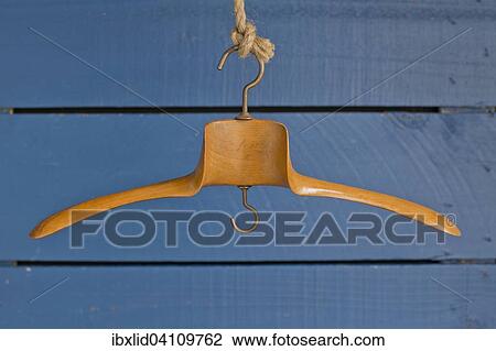 Wooden clothes hanger View Large Photo Image Stock Image - Wooden clothes hanger. Fotosearch