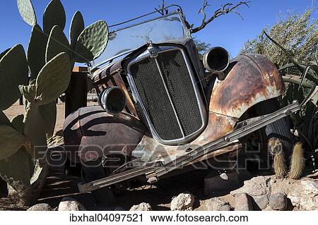 Wreck of a vintage car, Solitaire, Namibia, Africa View Large Photo Image Stock Image - Wreck of a vintage car, Solitaire, Namibia, Africa. Fotosearch