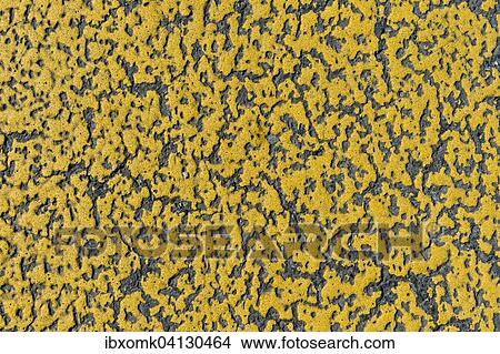 Picture - Yellow paint on asphalt, road marking details, Switzerland, Europe. Fotosearch