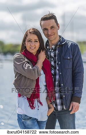 Young couple at the marina, Portrait, Boltenhagen, Mecklenburg-Western Pomerania, Germany, Europe View Large Photo Image Stock Image - Young couple at the marina, Portrait, Boltenhagen, Mecklenburg-Western Pomerania, Germany, Europe. Fotosearch