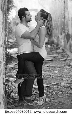Young couple in a ruined building View Large Photo Image Stock Image - Young couple in a ruined building. Fotosearch
