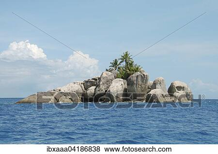 A small rocky island with palm trees off Mahe island, Seychelles, Africa View Large Photo Image Stock Photo - A small rocky island with palm trees off Mahe island, Seychelles, Africa. Fotosearch