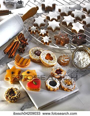 Assorted Christmas cookies on a cake rack View Large Photo Image Stock Image - Assorted Christmas cookies on a cake rack. Fotosearch