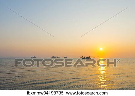 Stock Photography - Boat in the sea at sunset in front of small islands, Koh Samui, Gulf of Thailand, Thailand, Asia. Fotosearch