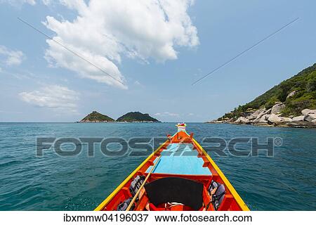 Stock Photo - Bow of a moving longtail boat in the turquoise sea, island of Koh Tao, Gulf of Thailand, Thailand, Asia. Fotosearch