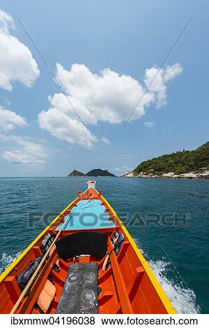 Stock Photo - Bow of a moving longtail boat in the turquoise sea, island of Koh Tao, Gulf of Thailand, Thailand, Asia. Fotosearch