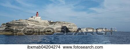 Chalk cliffs, lighthouse and Cave St. Antoine, Bonifacio, Corsica, France, Europe View Large Photo Image Picture - Chalk cliffs, lighthouse and Cave St. Antoine, Bonifacio, Corsica, France, Europe. Fotosearch