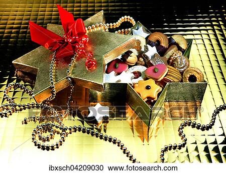 Christmas cookies in a star-shaped box View Large Photo Image Stock Image - Christmas cookies in a star-shaped box. Fotosearch