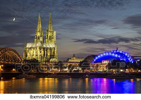 City-panorama of Cologne at dusk, Rhine, Hohenzollern Bridge, cathedral, the Musical Dome, Colonius TV tower, Cologne, North Rhine-Westphalia, Germany, Europe View Large Photo Image Stock Photograph - City-panorama of Cologne at dusk, Rhine, Hohenzollern Bridge, cathedral, the Musical Dome, Colonius TV tower, Cologne, North Rhine-Westphalia, Germany, Europe. Fotosearch