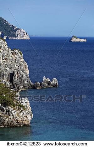 Cliffs in front of Paleokastrista with petrified ship of Odysseus, island Corfu, Ionian Islands, Greece, Europe View Large Photo Image Stock Image - Cliffs in front of Paleokastrista with petrified ship of Odysseus, island Corfu, Ionian Islands, Greece, Europe. Fotosearch
