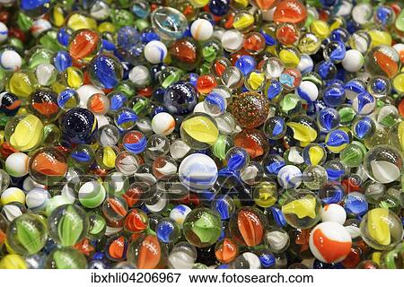 Stock Photo - Colorful glass marbles, Schussern. Fotosearch