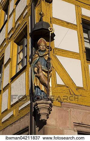 Figure Saint Giles on an old half-timbered house in the Weissgerbergasse, Sebalder Altstadt, Nuremberg, Middle Franconia, Franconia, Bavaria, Germany, Europe View Large Photo Image Stock Photo - Figure Saint Giles on an old half-timbered house in the Weissgerbergasse, Sebalder Altstadt, Nuremberg, Middle Franconia, Franconia, Bavaria, Germany, Europe. Fotosearch
