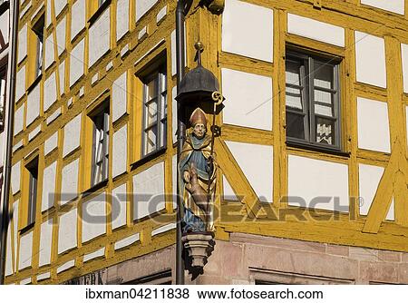 Figure Saint Giles on an old half-timbered house in the Weissgerbergasse, Sebalder Altstadt, Nuremberg, Middle Franconia, Franconia, Bavaria, Germany, Europe View Large Photo Image Stock Photo - Figure Saint Giles on an old half-timbered house in the Weissgerbergasse, Sebalder Altstadt, Nuremberg, Middle Franconia, Franconia, Bavaria, Germany, Europe. Fotosearch