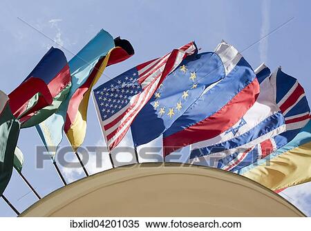 Flags, various nations above the entrance to hotel Astoria, Karlovy Vary, Czech Republic, Europe View Large Photo Image Stock Photography - Flags, various nations above the entrance to hotel Astoria, Karlovy Vary, Czech Republic, Europe. Fotosearch