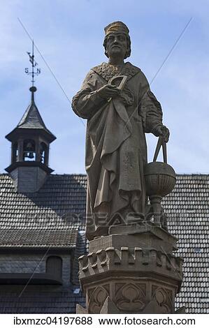 Fountain sculpture by Johann or Johannes Muller, later called Regiomontanus, mathematician and astronomer, 1463-1476, the town hall clock tower behind, Konigsberg in Bayern, Lower Franconia, Bavaria, Germany, Europe View Large Photo Image Stock Photo - Fountain sculpture by Johann or Johannes Muller, later called Regiomontanus, mathematician and astronomer, 1463-1476, the town hall clock tower behind, Konigsberg in Bayern, Lower Franconia, Bavaria, Germany, Europe. Fotosearch