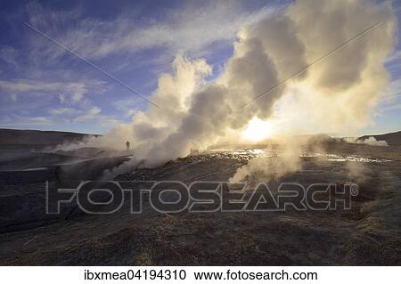 Stock Image - Geysers of the thermal field Sol de Manana during sunrise, Potosi, Bolivia, South America. Fotosearch