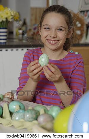 Girl colouring Easter eggs for the Easter basket, coloured eggs, Easter, Upper Bavaria, Bavaria, Germany, Europe View Large Photo Image Stock Image - Girl colouring Easter eggs for the Easter basket, coloured eggs, Easter, Upper Bavaria, Bavaria, Germany, Europe. Fotosearch