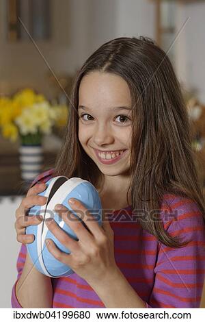 Girl with a large Easter egg, Easter gift, Upper Bavaria, Bavaria, Germany, Europe View Large Photo Image Stock Image - Girl with a large Easter egg, Easter gift, Upper Bavaria, Bavaria, Germany, Europe. Fotosearch