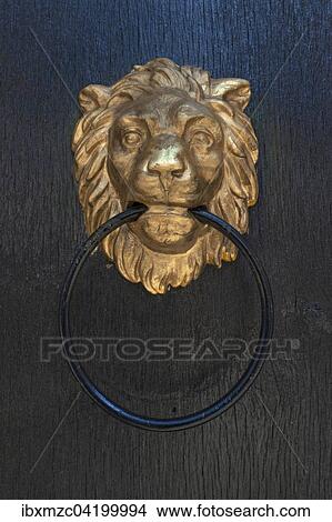 Golden lion head as door knocker, Amberg, Upper Palatinate, Bavaria, Germany, Europe View Large Photo Image Picture - Golden lion head as door knocker, Amberg, Upper Palatinate, Bavaria, Germany, Europe. Fotosearch