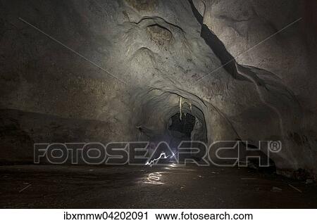 Hikers, tourists walking through a cave with a torch, Kuala Tahan, Taman Negara National Park, Malaysia, Asia View Large Photo Image Stock Image - Hikers, tourists walking through a cave with a torch, Kuala Tahan, Taman Negara National Park, Malaysia, Asia. Fotosearch