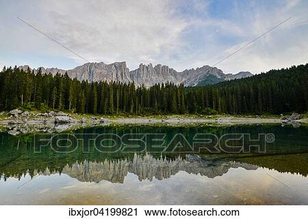 Karersee lake in front of Latemar, Lago di Carezza, Carezza, Dolomites, Trentino Province, Province of South Tyrol, Italy, Europe View Large Photo Image Stock Image - Karersee lake in front of Latemar, Lago di Carezza, Carezza, Dolomites, Trentino Province, Province of South Tyrol, Italy, Europe. Fotosearch