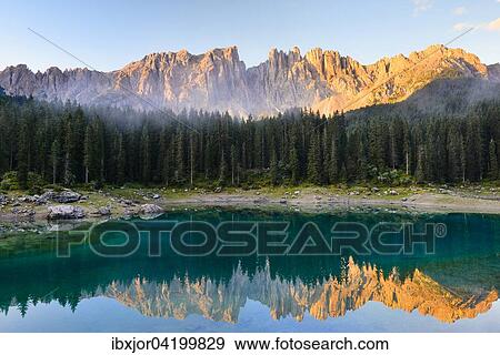 Stock Photo - Karersee lake in front of Latemar, Lago di Carezza, Carezza, Dolomites, Trentino Province, Province of South Tyrol, Italy, Europe. Fotosearch