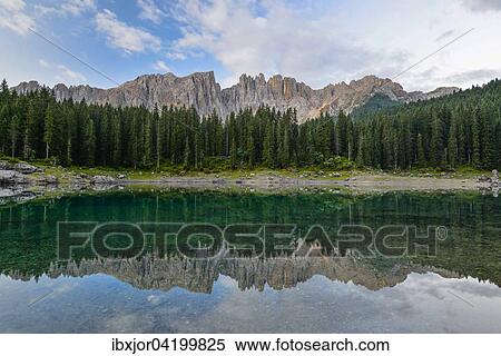 Stock Photography - Karersee lake in front of Latemar, Lago di Carezza, Carezza, Dolomites, Trentino Province, Province of South Tyrol, Italy, Europe. Fotosearch