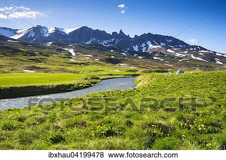 Landscape with green meadows, river and mountain near Bakki, Northern Iceland, Iceland, Europe View Large Photo Image Stock Photo - Landscape with green meadows, river and mountain near Bakki, Northern Iceland, Iceland, Europe. Fotosearch