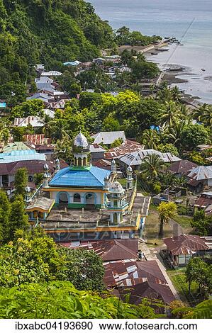Stock Image - Lonthor with mosque, Banda, Moluccas, Indonesia, Asia. Fotosearch