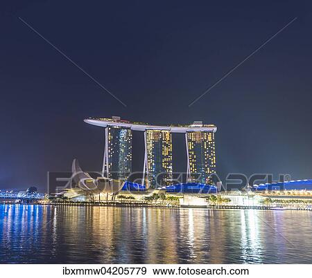 Stock Photo - Marina Bay Sands Hotel by the Singapore River at night, Marina Bay, Singapore, Asia. Fotosearch