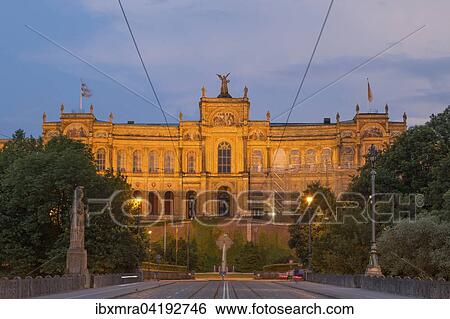 Stock Photograph - Maximilianeum at sunset, Maximiliansbrucke bridge in front, Munich, Bavaria, Germany, Europe. Fotosearch