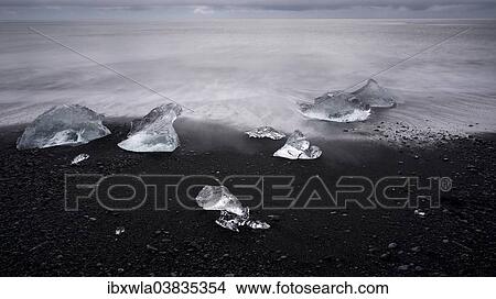 Melted icebergs on the beach of Jokulsarlon, Jokulsarlon, southwest coast, Iceland, Europe View Large Photo Image Picture - Melted icebergs on the beach of Jokulsarlon, Jokulsarlon, southwest coast, Iceland, Europe. Fotosearch