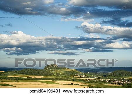 Moody lighting in the Hegau, Hohentwiel in the distance, district of Konstanz, Baden-Wurttemberg, Germany, Europe View Large Photo Image Stock Image - Moody lighting in the Hegau, Hohentwiel in the distance, district of Konstanz, Baden-Wurttemberg, Germany, Europe. Fotosearch