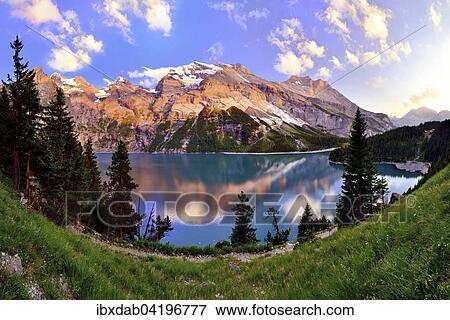 Mountains in the evening light at the Oeschinensee lake, UNESCO World Heritage Site, Kandersteg, Canton of Bern, Switzerland, Europe View Large Photo Image Stock Photo - Mountains in the evening light at the Oeschinensee lake, UNESCO World Heritage Site, Kandersteg, Canton of Bern, Switzerland, Europe. Fotosearch