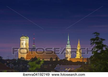 Munich Cathedral or St. Mary's Church, St. Peter, City Hall Tower and the Olympic Tower at night, Munich, Bavaria, Germany, Europe View Large Photo Image Stock Photo - Munich Cathedral or St. Mary's Church, St. Peter, City Hall Tower and the Olympic Tower at night, Munich, Bavaria, Germany, Europe. Fotosearch