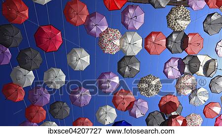 Open umbrellas, parasols as street decoration, Manfredonia, Appulien, Italy, Europe View Large Photo Image Stock Photo - Open umbrellas, parasols as street decoration, Manfredonia, Appulien, Italy, Europe. Fotosearch