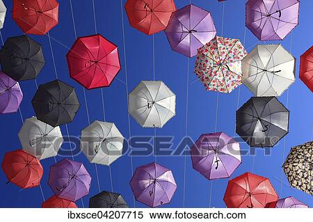 Open umbrellas, parasols as street decoration, Manfredonia, Appulien, Italy, Europe View Large Photo Image Stock Photography - Open umbrellas, parasols as street decoration, Manfredonia, Appulien, Italy, Europe. Fotosearch