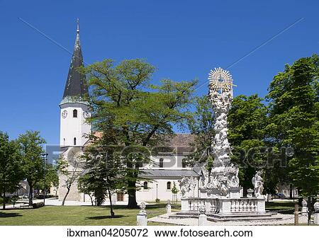 Parish Church of St. Vitus and the Holy Trinity Column on the church square, Laa an der Thaya, Weinviertel, Lower Austria, Austria, Europe View Large Photo Image Stock Image - Parish Church of St. Vitus and the Holy Trinity Column on the church square, Laa an der Thaya, Weinviertel, Lower Austria, Austria, Europe. Fotosearch