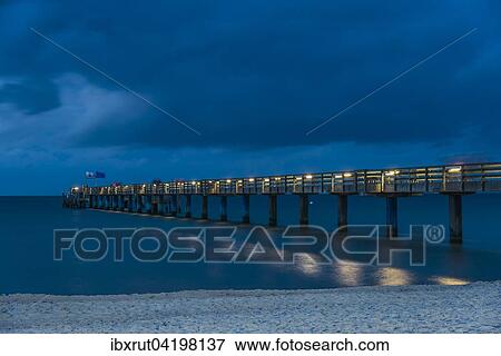 Pier in the evening, Baltic Sea, Bad Boltenhagen, Mecklenburg-Western Pomerania, Germany, Europe View Large Photo Image Stock Photo - Pier in the evening, Baltic Sea, Bad Boltenhagen, Mecklenburg-Western Pomerania, Germany, Europe. Fotosearch
