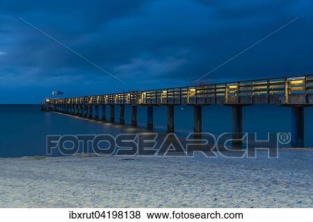 Stock Photo - Pier in the evening, Baltic Sea, Bad Boltenhagen, Mecklenburg-Western Pomerania, Germany, Europe. Fotosearch