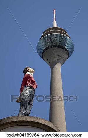 Saulenheilige, sculpture by Christopher Poggeler, Rhine Tower, Dusseldorf, Rhineland, North Rhine-Westphalia, Germany, Europe View Large Photo Image Picture - Saulenheilige, sculpture by Christopher Poggeler, Rhine Tower, Dusseldorf, Rhineland, North Rhine-Westphalia, Germany, Europe. Fotosearch