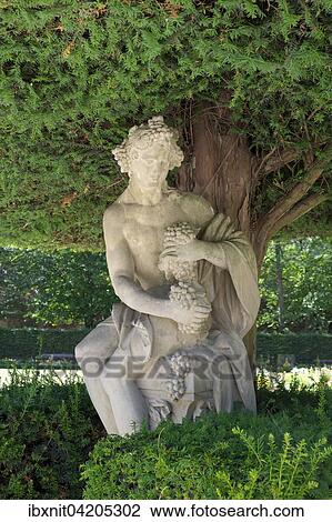 Stock Image - Sculpture of Bacchus in the courtyard garden, Residenz, Wurzburg, Lower Franconia, Bavaria, Germany, Europe. Fotosearch