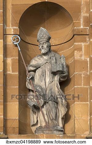 Stock Photo - Sculpture of St. Wolfgang, 934-994, St. Wenceslaus Church, Litzendorf, Upper Franconia, Bavaria, Germany, Europe. Fotosearch