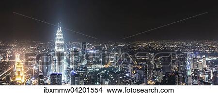 Skyline at night, Petronas Towers, Kuala Lumpur, Malaysia, Asia View Large Photo Image Picture - Skyline at night, Petronas Towers, Kuala Lumpur, Malaysia, Asia. Fotosearch
