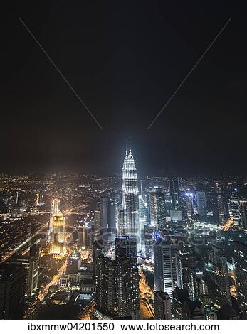 Stock Image - Skyline at night, Petronas Towers, Kuala Lumpur, Malaysia, Asia. Fotosearch