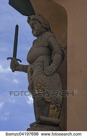 Southernmost Roland figure in Germany, on the sign the Saxon and the Konigsberg coat of arms and the Imperial Eagle, town hall, Konigsberg in Bayern, Lower Franconia, Bavaria, Germany, Europe View Large Photo Image Stock Photo - Southernmost Roland figure in Germany, on the sign the Saxon and the Konigsberg coat of arms and the Imperial Eagle, town hall, Konigsberg in Bayern, Lower Franconia, Bavaria, Germany, Europe. Fotosearch